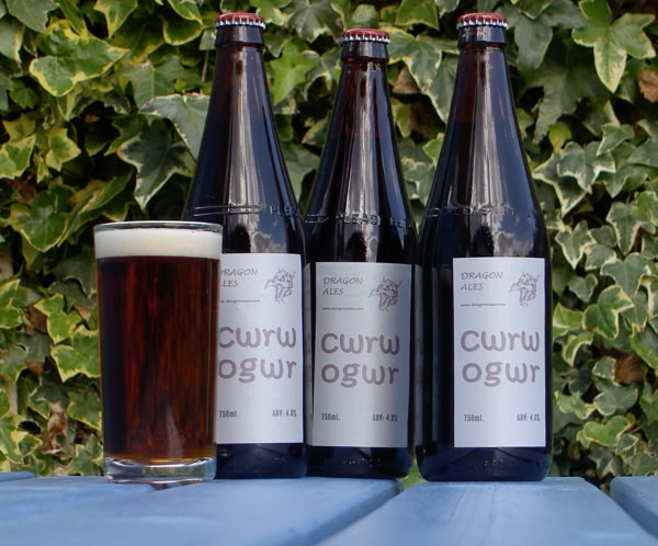 A person writing a website creation mindmap on a whiteboard during a business meeting.